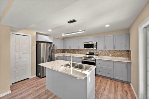 Fabulous open kitchen/dining area.  All new appliances throughout.  Custom made staircase spindles. Click here for details.